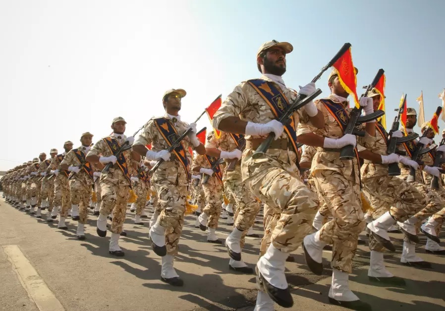 Members of the Iranian revolutionary guard march during a parade to commemorate the anniversary of the Iran-Iraq war (1980-88), in Tehran September 22, 2011.. (photo credit: REUTERS)