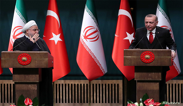 الرئيس التركي رجب طيب أردوغان، مع نظيره الإيراني حسن روحاني