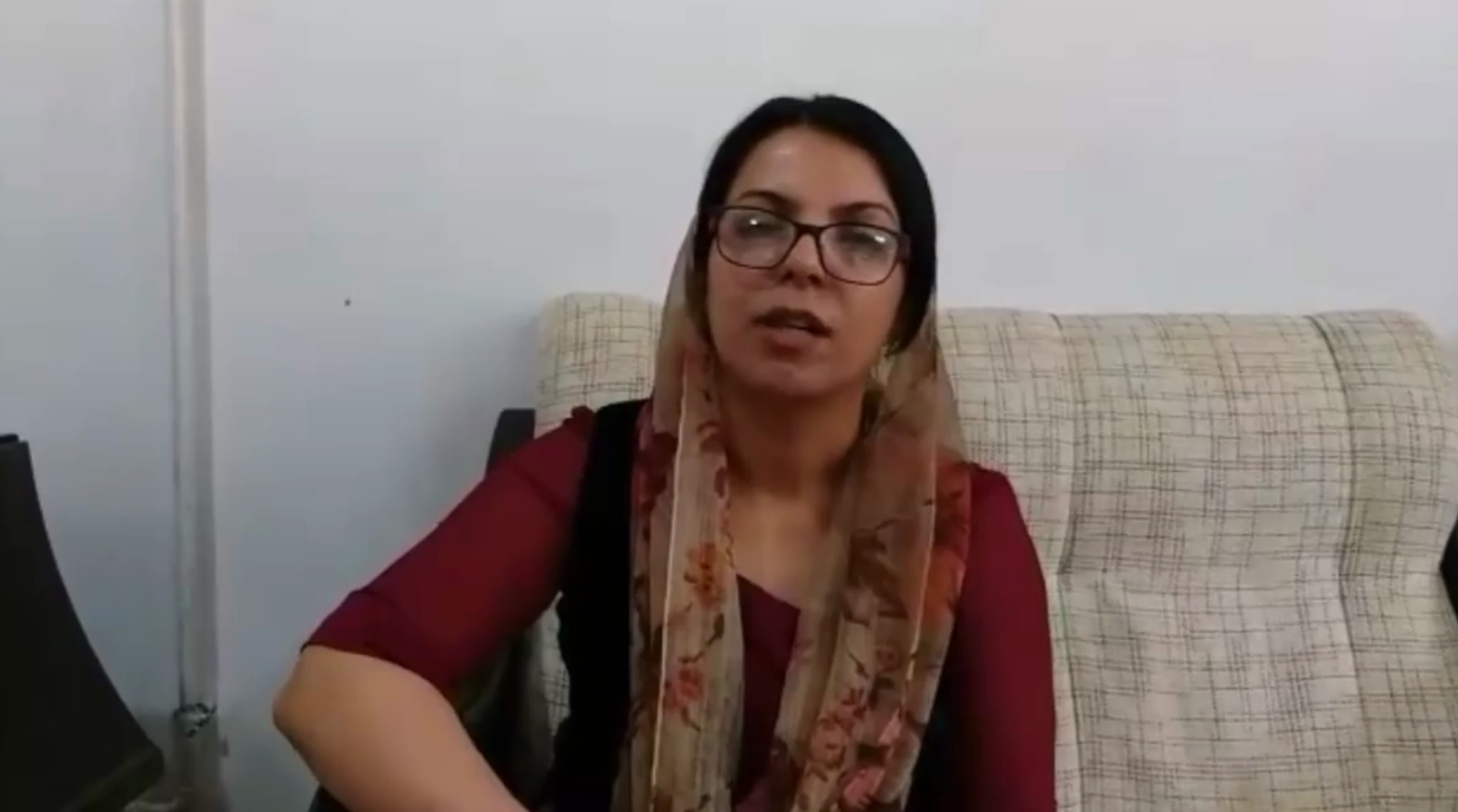 Kurdish activist says she tortured to confess in Iran