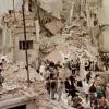 Rescue workers search the remains of the AMIA headquarters in Buenos Aires, Argentina, in 1994.