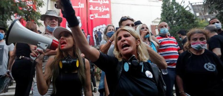 Lebanese protesters chant ‘Iran gets out, Beirut is free’